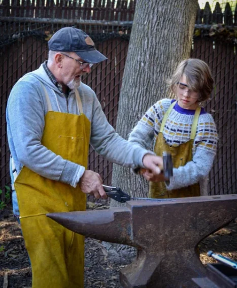 Teacher and students gathered outdoors for a storytelling lesson