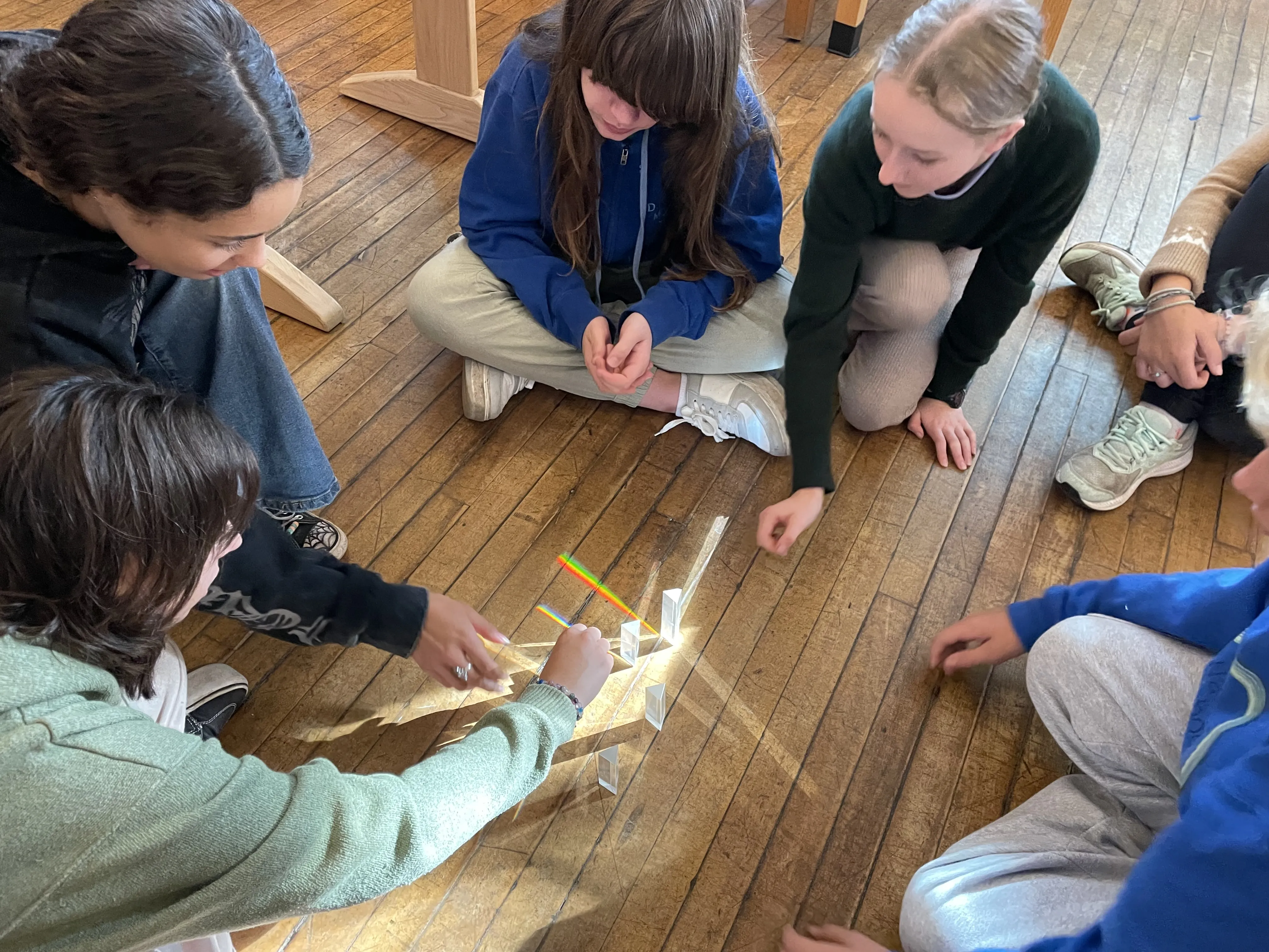 Middle school students conducting a hands-on science experiment