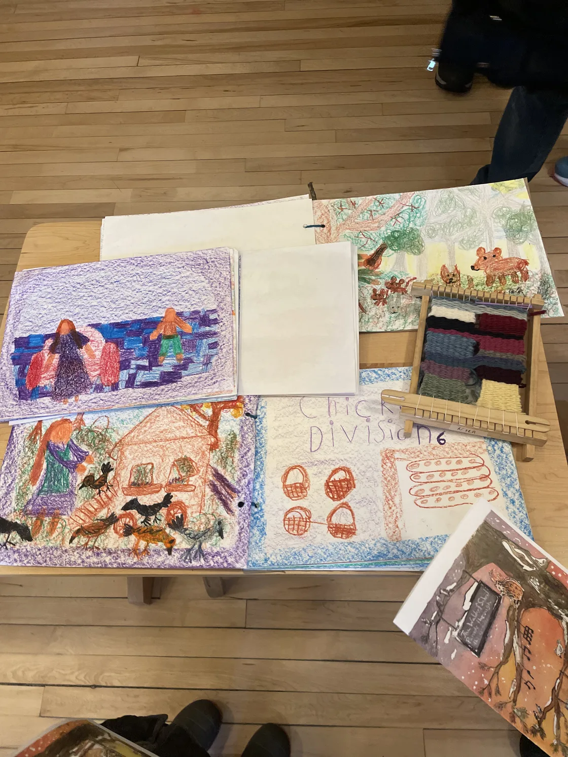 Students creating detailed illustrations in their Main Lesson books