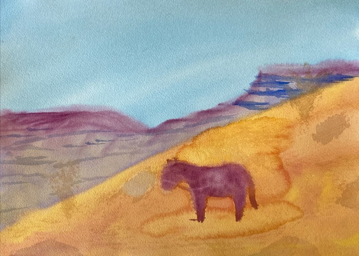 A student's watercolor painting of a Southwest desert landscape